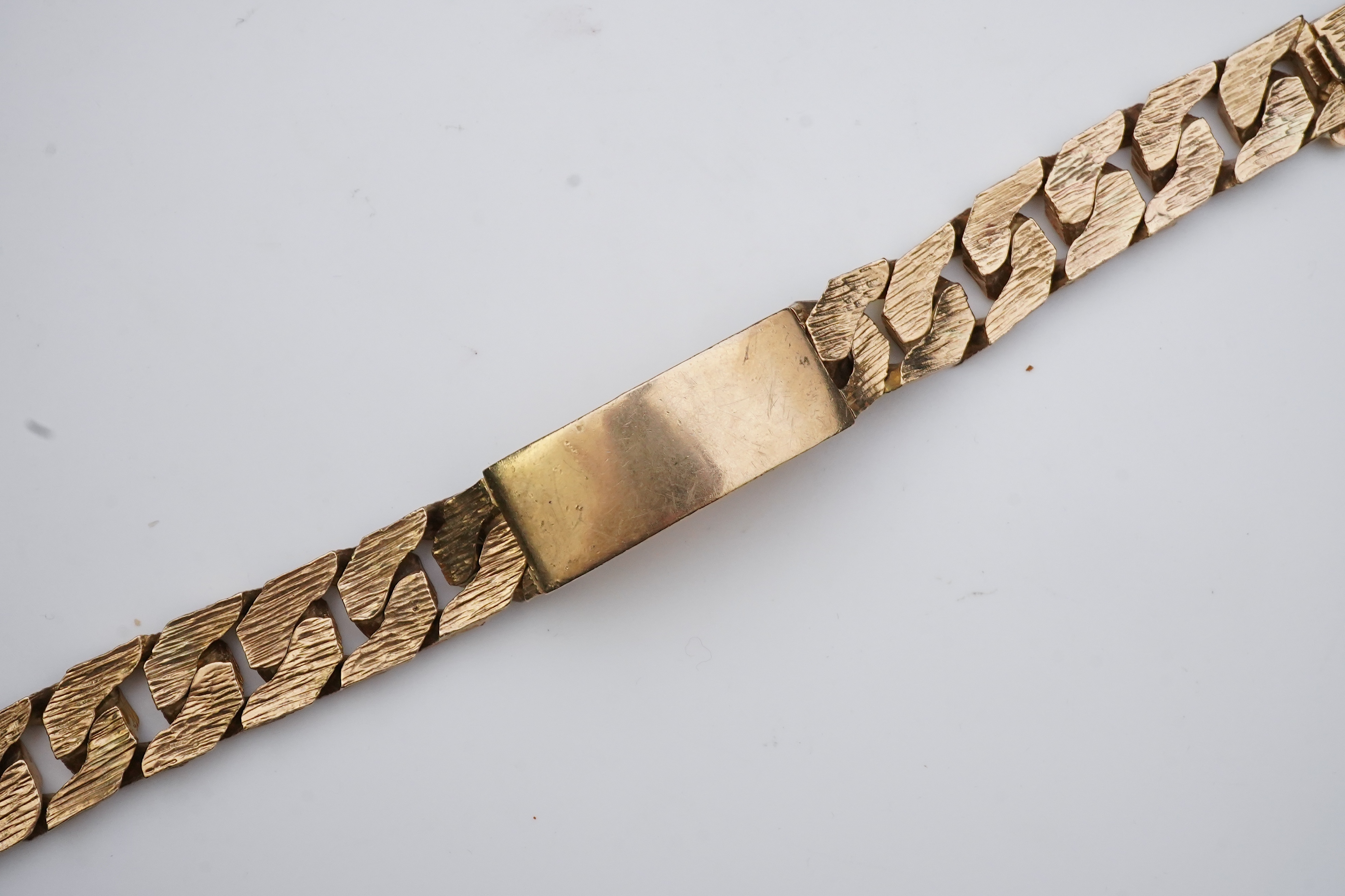 A 9ct gold identity bracelet, circa 1973